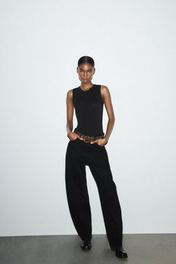 SLEEVELESS BODYSUIT
