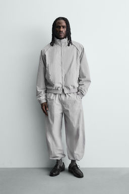 CHAQUETA T?CNICA CONTRASTES / Gris claro