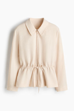Camisa con cremallera y peplum