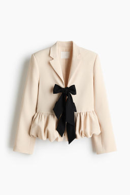 Blazer con bajo globo