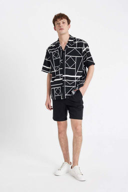 Хлопковые шорты-бермуды свободного покроя