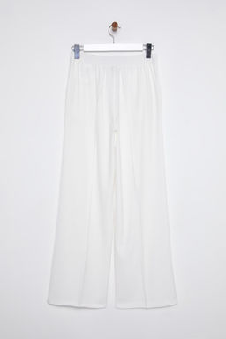 TRENDYOLMILLA Beyaz Arkas? Lastikli Wide Leg/Genis Paca Dusuk Bel Dokuma Pantolon TWOSS25PL00021  фото 10