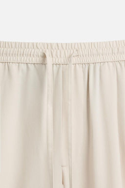 RELAXED FIT LYOCELL TROUSERS - Zara фото 29