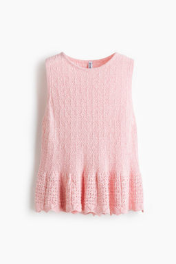 Top en punto pointelle con peplum