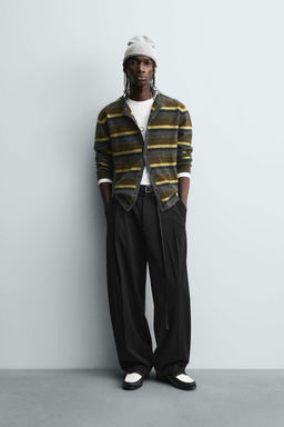 BALLOON TROUSERS WITH PLEATS AND BELT