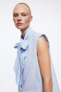Blusa con lazada