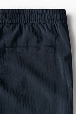 Pantal?n texturizado Relaxed Fit - H&m фото 9
