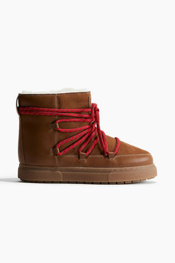 Botas acolchadas con cordones