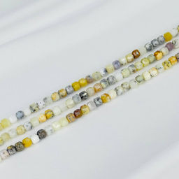 Бусины для украшений из Кахолонга (65 бусин) 38 см