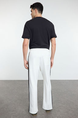 TRENDYOL MAN Siyah Oversize/Genis Kesim Ac?k Paca Renk Bloklu Esofman Alt? TMNAW25EA00006 - Trendyolmilla фото 12