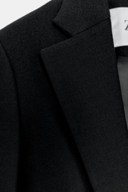 100% WOOL LIMITED EDITION COAT