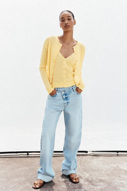 POINTELLE KNIT TOP WITH FRILLS