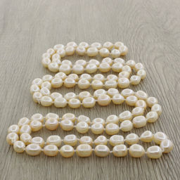 Жемчуг розовый, овальный 8х9мм, бусы длинной 116см