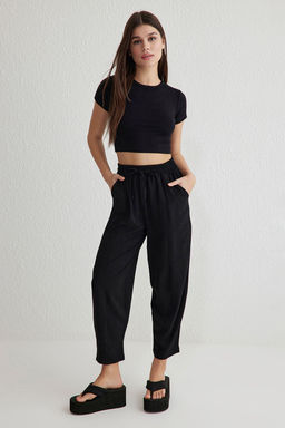 TRENDYOLMILLA Siyah Beli Lastikli Harem/Salvar Rahat Kesim Dokuma Pantolon TWOSS25PL00027