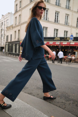 KNIT TROUSERS WITH CUTWORK EMBROIDERY