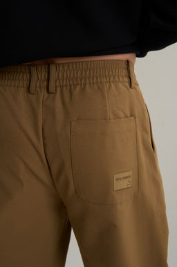 Брюки текстильные Коричневый COMMUTE Woven Track Pants - Anta фото 7