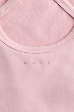 Top de deporte SoftMove con sujetador integrado - H&m фото 13
