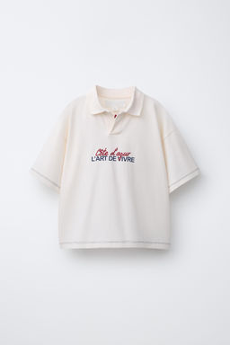 POLO ESTAMPADO TEXTO / Blanco