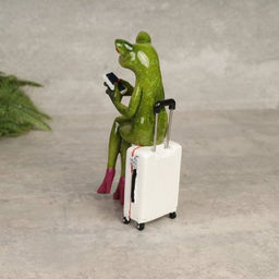 Фигурка Лягушка на чемодане с телефоном 16 см / YX39052 /уп 24/ - Галеонтрейд фото 2