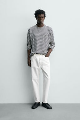 JEANS SLIM TAPERED FIT / Blanco