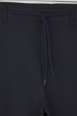 Lacivert Slim Fit Beli Baglama Detayl? Lastikli Kumas Dokuma Pantolon TMNAW25PL00027
