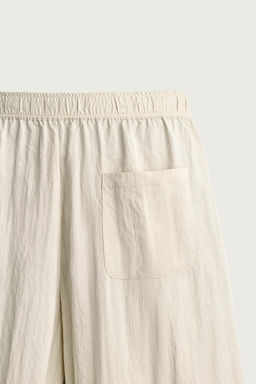 PANTAL?N T?CNICO RELAXED FIT EFECTO ARRUGADO / Beige - Zara фото 9