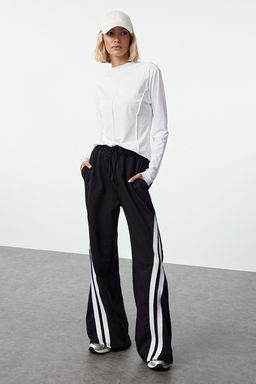 TRENDYOLMILLA Siyah Renk Bloklu Serit Detayl? Genis Paca Orme Spor Esofman Alt? THMAW25EA00000
