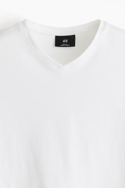 Camiseta con escote de pico Slim Fit - H&m фото 6