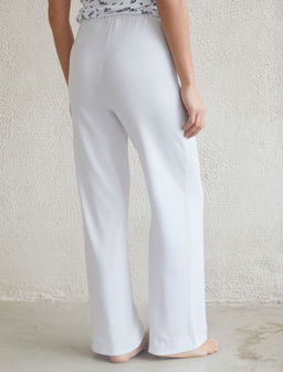 Прямые брюки с поясом на резинке из фактурного трикотажа в рубчик - Vilatte фото 3