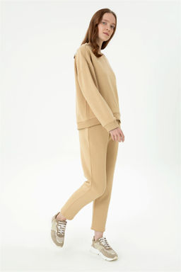 Женские спортивные штаны песочного цвета Неожиданная скидка в корзине