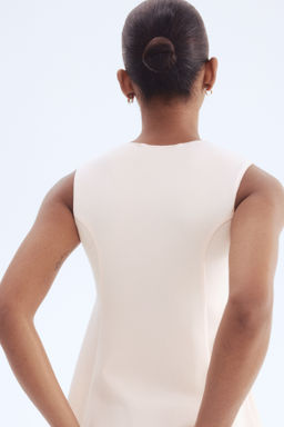 Top interlock con peplum - H&m фото 5