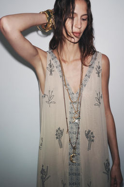 PACK OF 2 SUN AND MOON CHARM NECKLACES