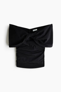 Top off-the-shoulder con detalle girado