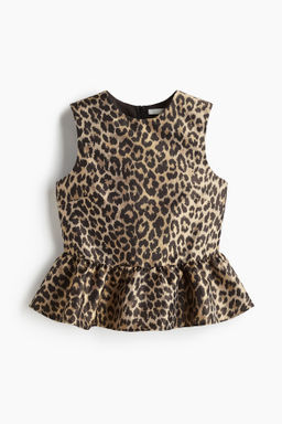 Top en tejido jacquard con peplum