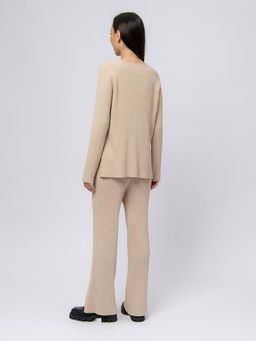 Брюки трикотажные бежевого цвета расклешенные - 1001dress фото 2