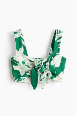 Crop top con nudo decorativo