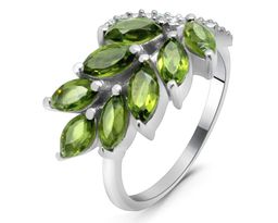 Кольцо из серебра оливковая шпинель, Ель