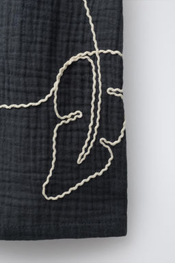 TEXTURED EMBROIDERED BERMUDA SHORTS