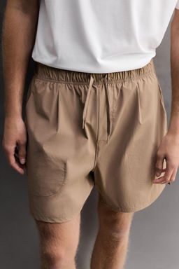 PANTALONES CORTOS T?CNICOS TRAINING / Marr?n claro