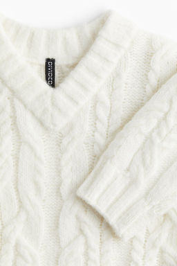 Jersey en punto trenzado con escote de pico - H&m фото 7