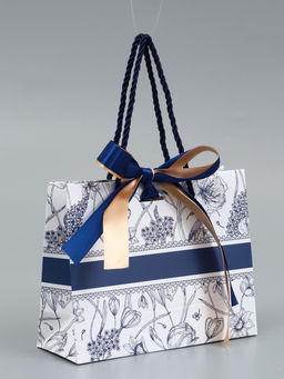 Пакет подарочный "Цветы", с бантом, 19 х 15 х 7 см