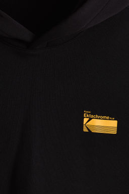 Sudadera estampada con capucha Loose Fit - H&m фото 10