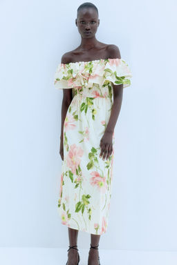 Vestido off-the-shoulder con volantes