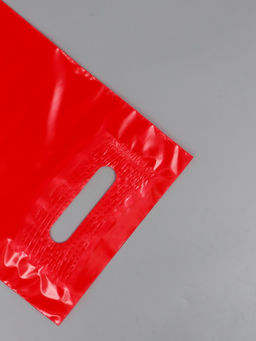 Цена за 50 шт. Пакет полиэтиленовый с вырубной ручкой, Красный 20х30 см, 50 мкм