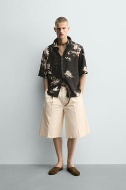 CAMISA FLUIDA ESTAMPADO FLORAL / Negro