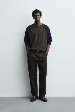 RELAXED FIT PLEATED TROUSERS