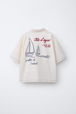 POLO ESTAMPADO TEXTO / Blanco
