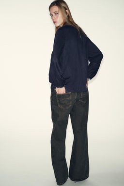 BLOUSE WITH TIE AND CONTRAST TOPSTITCHING