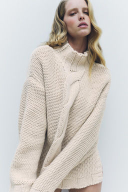 CABLE KNIT SWEATER