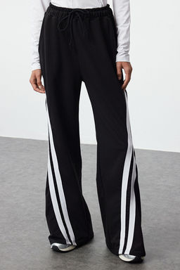 TRENDYOLMILLA Siyah Renk Bloklu Serit Detayl? Genis Paca Orme Spor Esofman Alt? THMAW25EA00000